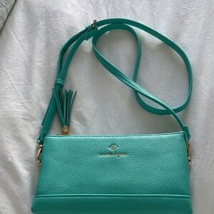 Nanette Lepore turquoise pebbled leather crossbody with tassel, removable strap